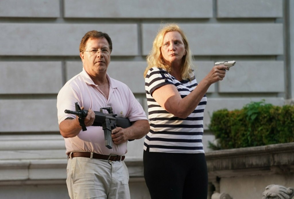 White Couple with Guns