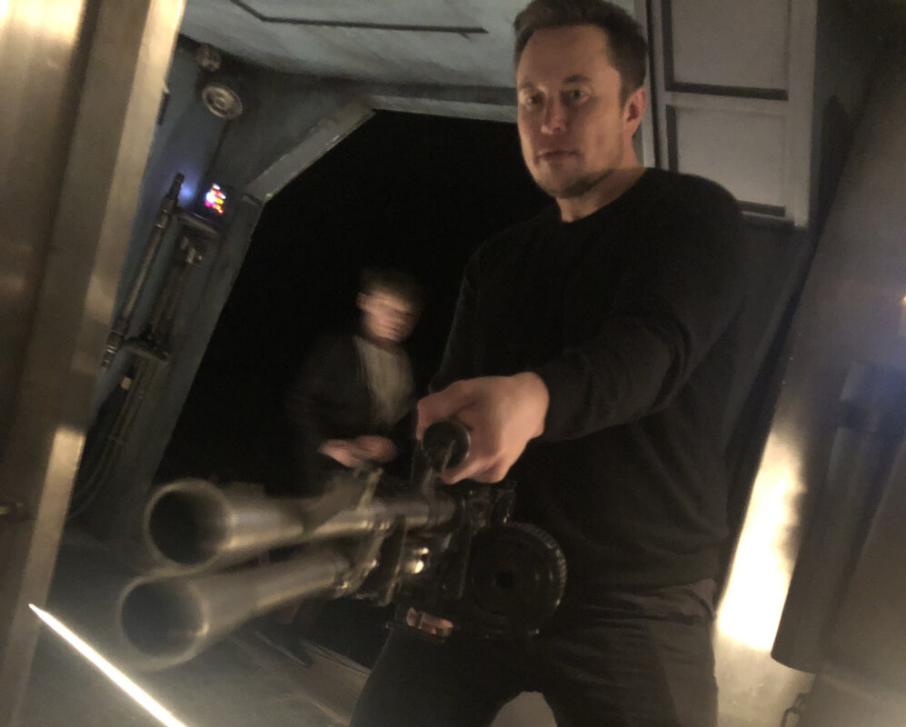 Elon Musk with a Flamethrower
